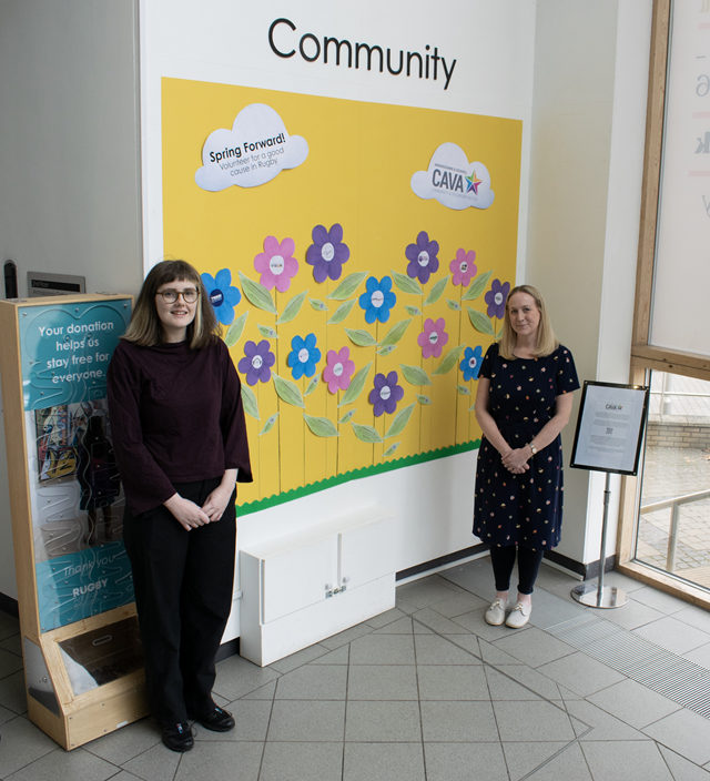 (left to right) Phoebe Hilton, Rugby Art Gallery and Museum's senior learning and engagement officer, and Amy Muzyka, Warwickshire and Solihull Community Voluntary Action's (WCAVA) volunteering co-ordinator for Rugby, at the display in the venue's community space.